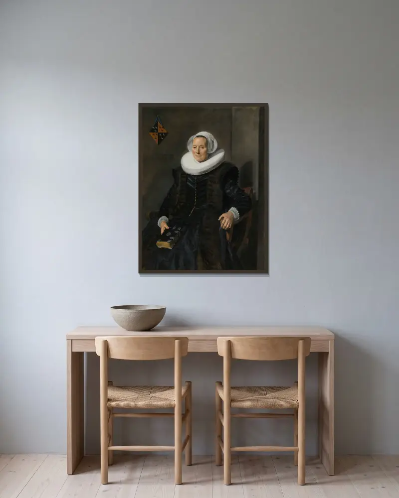 Portrait of Maritge Claesdr Vooght av Frans Hals inramad på en vägg