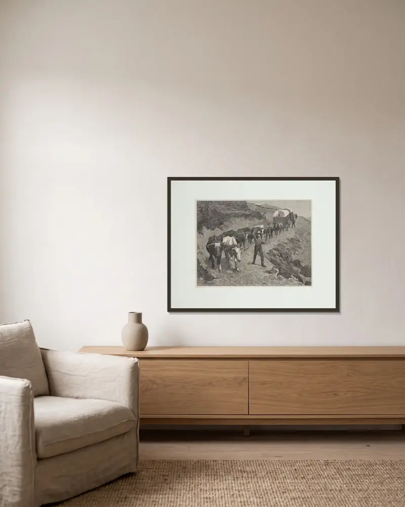 En oxskjuts i bergen av Frederic Remington inramad på en vägg