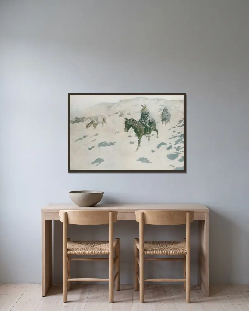 Drivande före stormen av Frederic Remington inramad på en vägg
