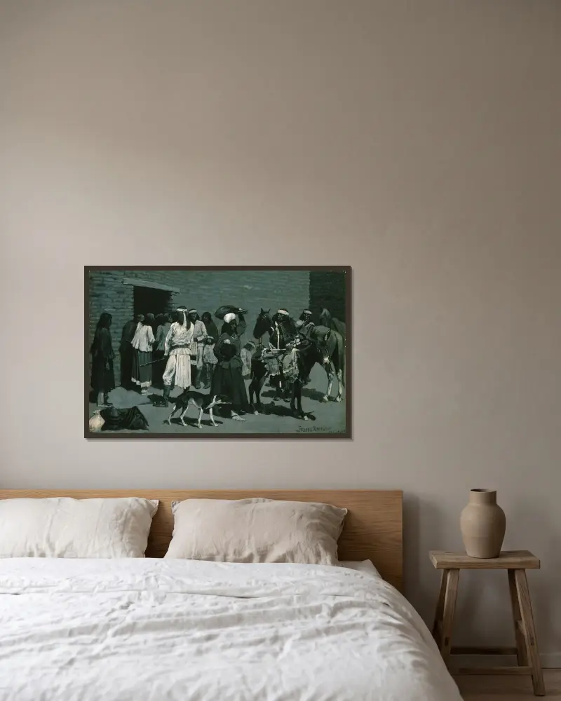 Pueblo-indianby av Frederic Remington inramad på en vägg