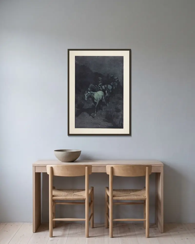 Klockan av Frederic Remington inramad på en vägg