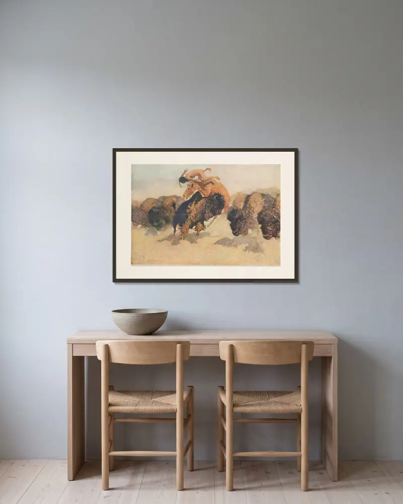 Buffeljägaren av Frederic Remington inramad på en vägg