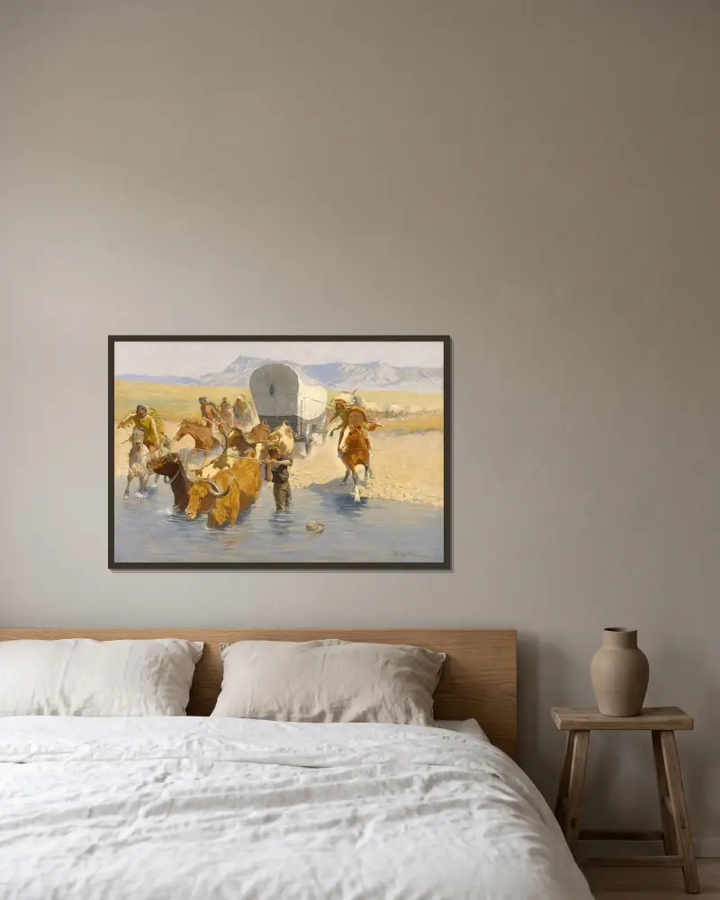 Emigranterna av Frederic Remington inramad på en vägg