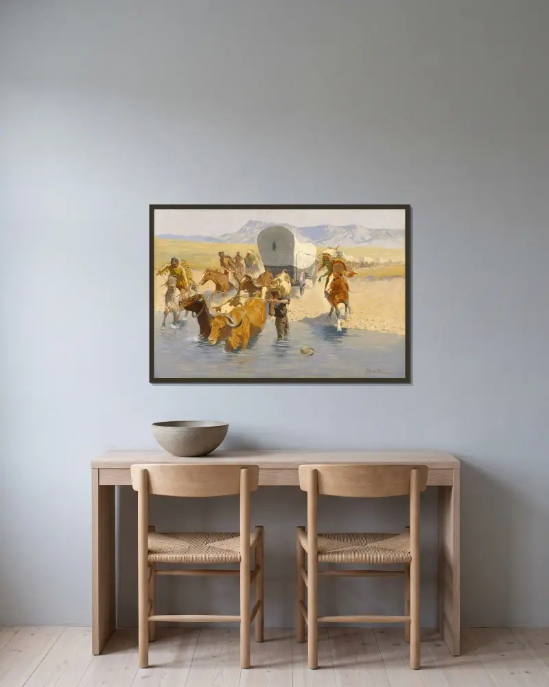 Emigranterna av Frederic Remington inramad på en vägg