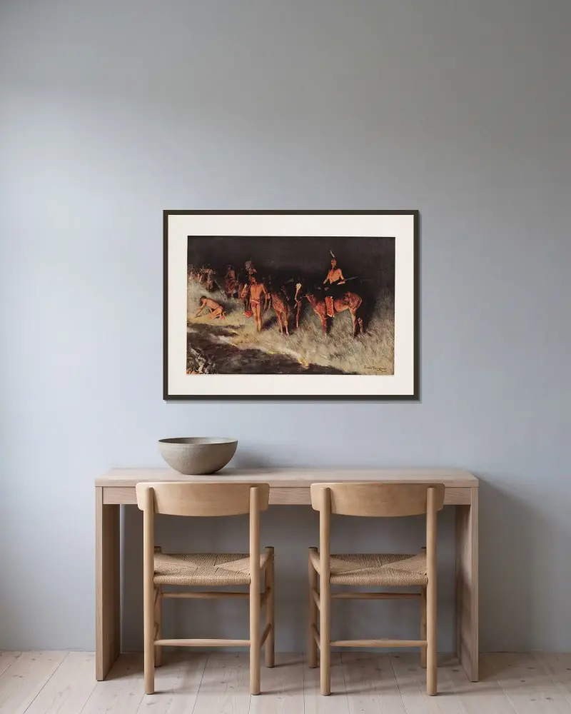 Gräsbranden av Frederic Remington inramad på en vägg