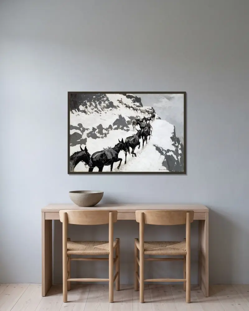 Mulpaketet av Frederic Remington inramad på en vägg