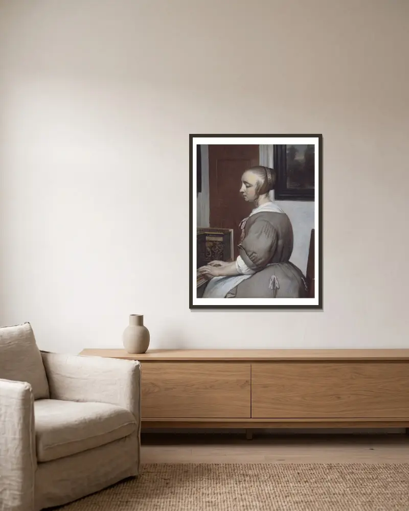 Femme au virginal av Gabriel Metsu inramad på en vägg