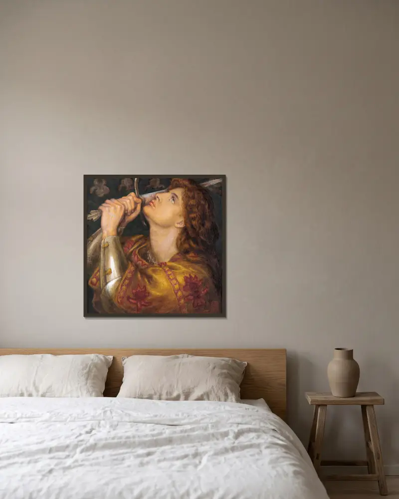 Joan of Arc av Dante Gabriel Rossetti inramad på en vägg