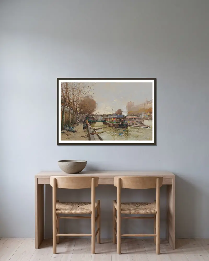Le Quai de la Seine av Eugène Galien-Laloue inramad på en vägg