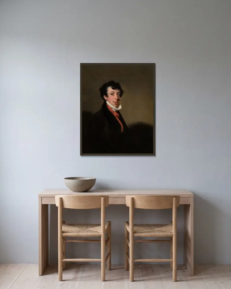 Porträtt av en gentleman i brun rock och röd kravatt av George Chinnery inramad på en vägg