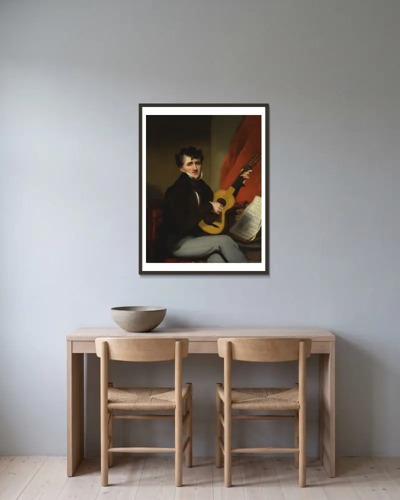 Portrait of a Man Playing a Guitar av George Chinnery inramad på en vägg