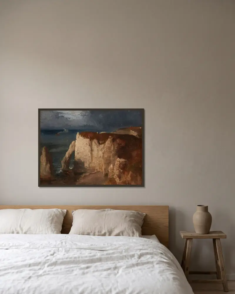 Étretat av George Inness inramad på en vägg