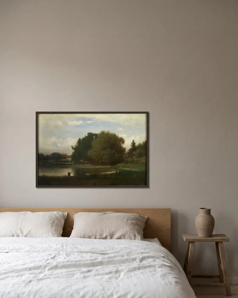 Landskap av George Inness inramad på en vägg