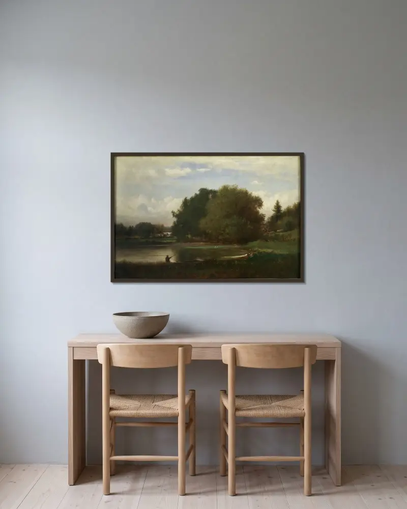 Landskap av George Inness inramad på en vägg