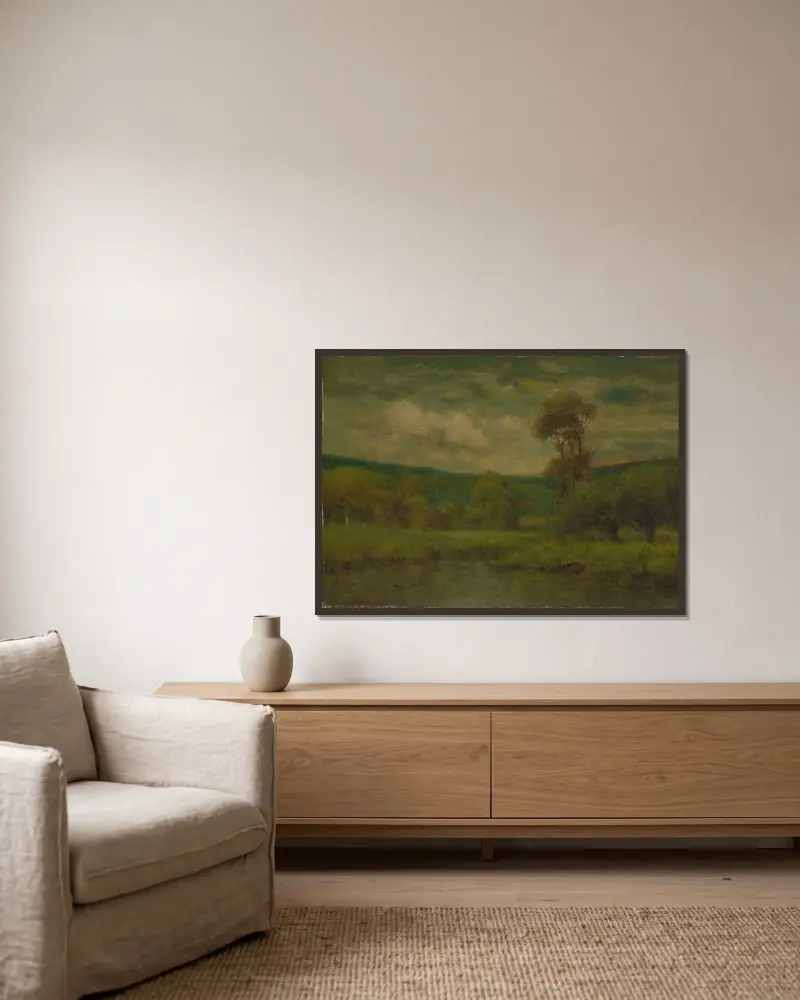 Landskap av George Inness inramad på en vägg