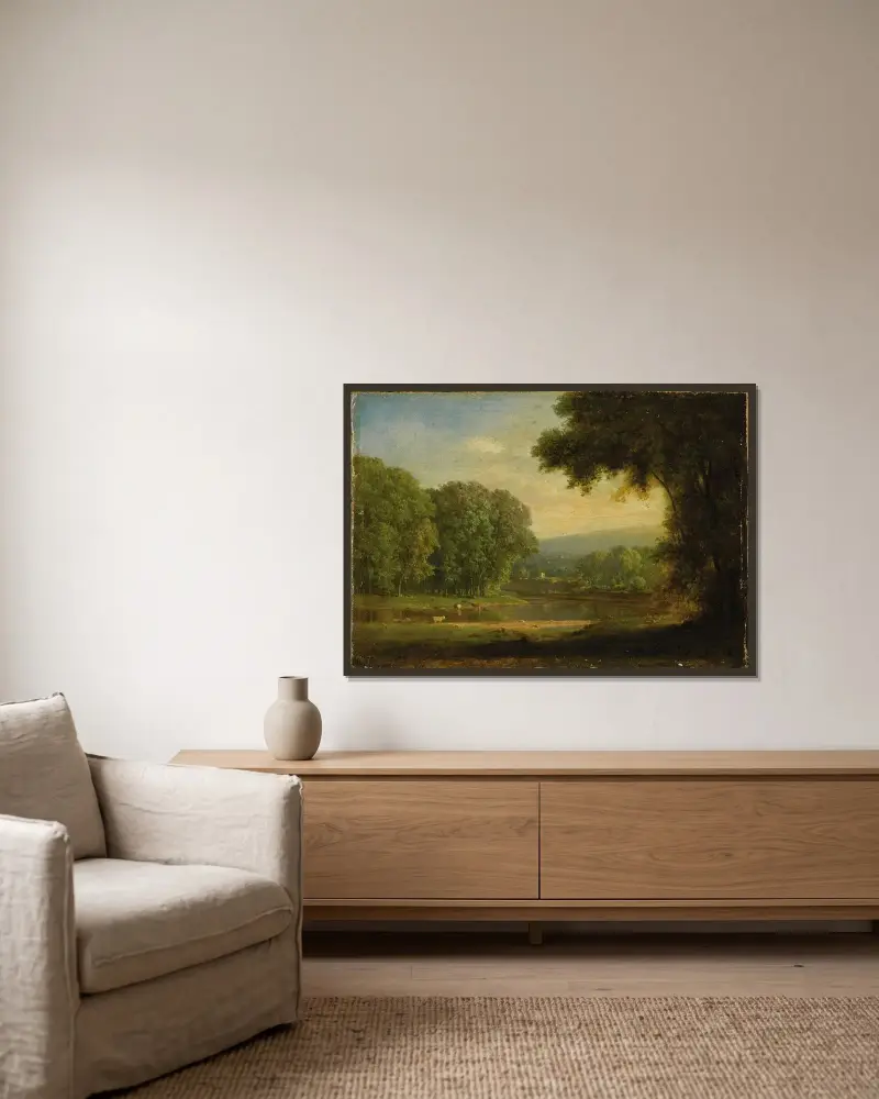 Landskap av George Inness inramad på en vägg