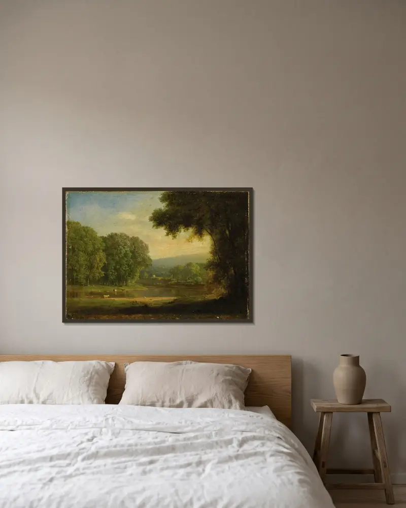 Landskap av George Inness inramad på en vägg