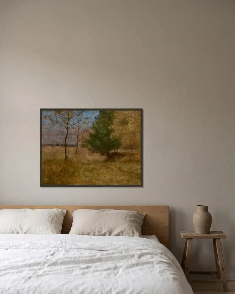 Skogsstig av George Inness inramad på en vägg