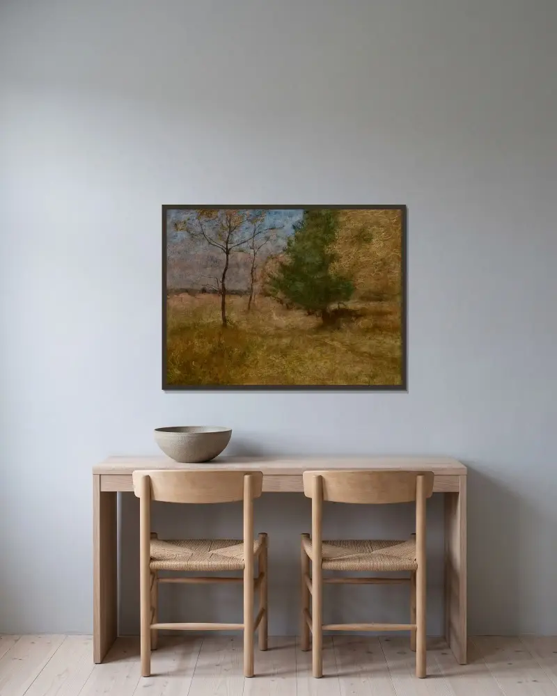 Skogsstig av George Inness inramad på en vägg