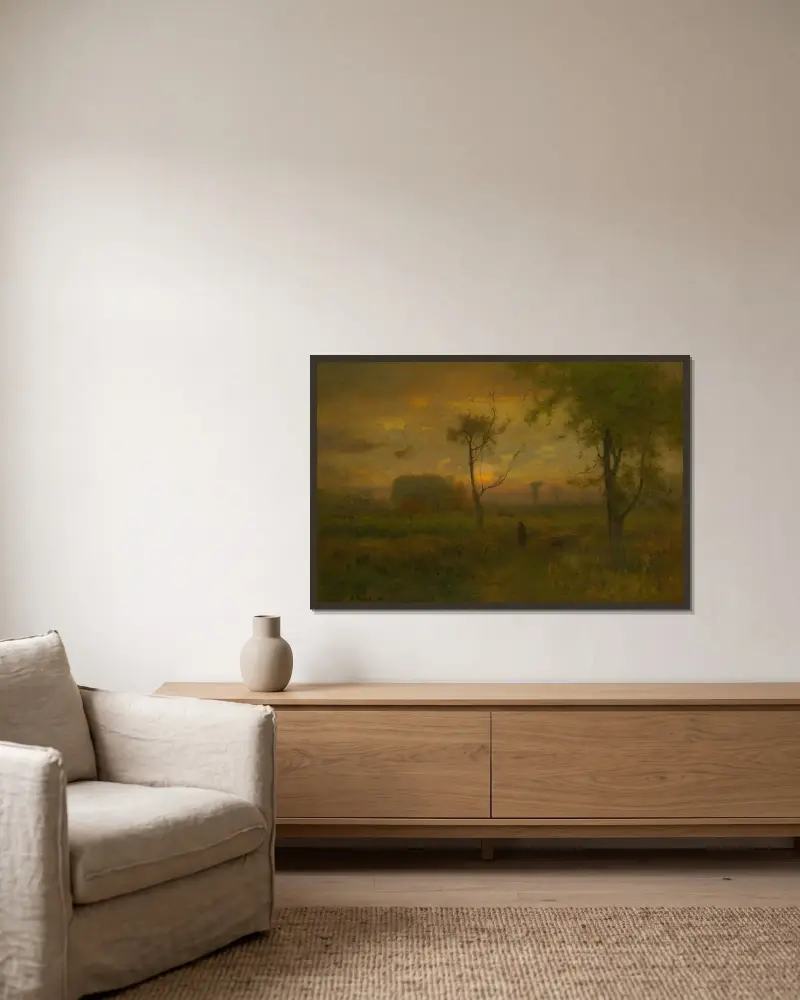 Soluppgång av George Inness inramad på en vägg