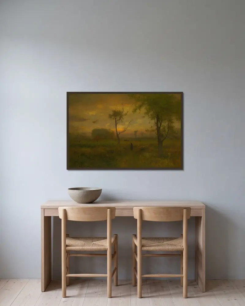 Soluppgång av George Inness inramad på en vägg