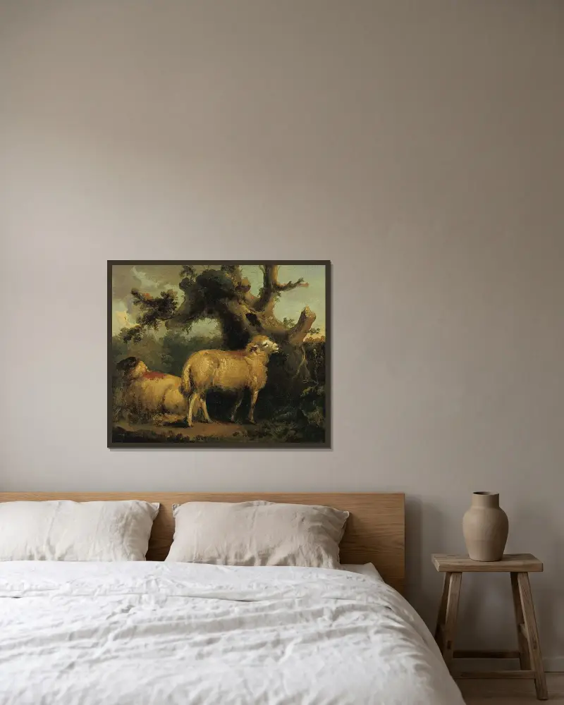 Två får i ett landskap av George Morland inramad på en vägg