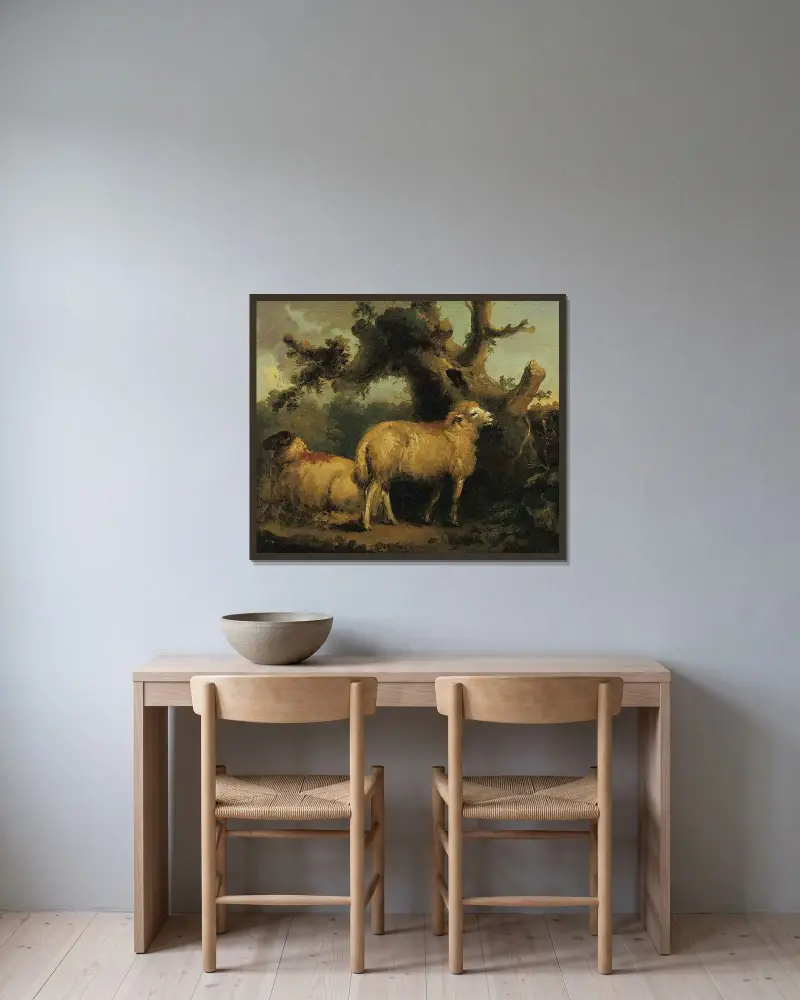 Två får i ett landskap av George Morland inramad på en vägg