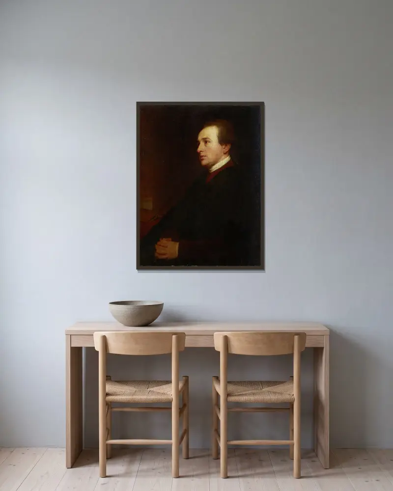 Portrait of a Young Man at his Desk av George Romney inramad på en vägg