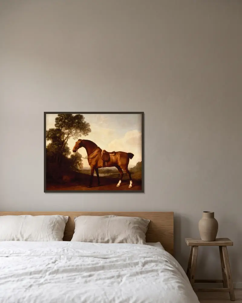 En sadlad brun jaktspringare av George Stubbs inramad på en vägg