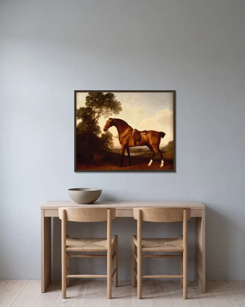 En sadlad brun jaktspringare av George Stubbs inramad på en vägg