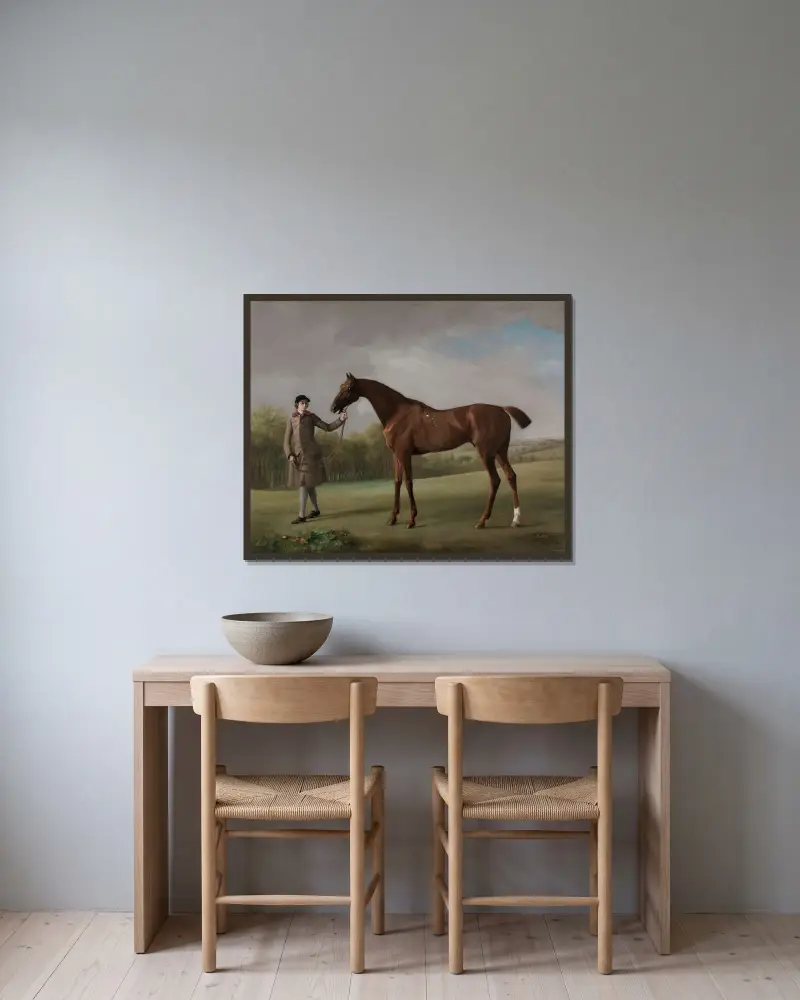 Lustre, hållen av en stalldräng av George Stubbs inramad på en vägg