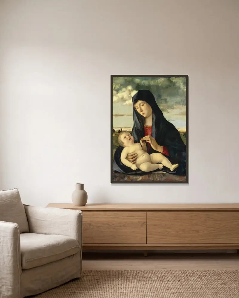 Madonna and Child in a Landscape av Giovanni Bellini inramad på en vägg