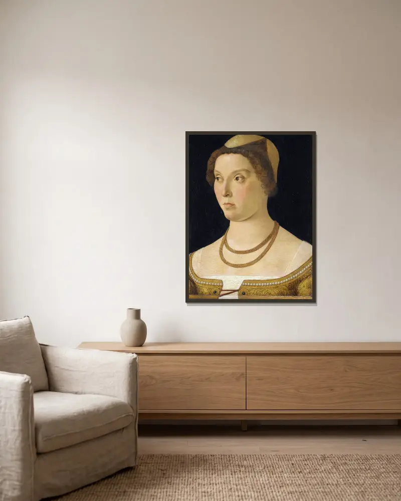 Portrait of a Woman av Giovanni Bellini inramad på en vägg