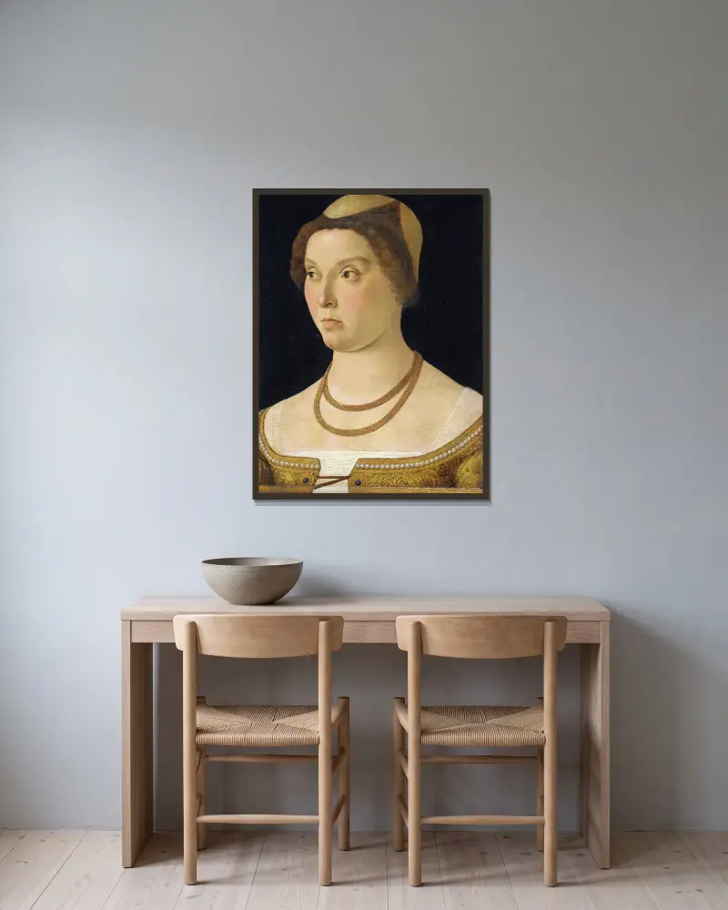 Portrait of a Woman av Giovanni Bellini inramad på en vägg
