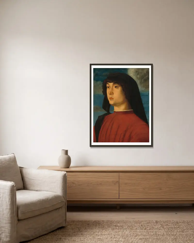 Portrait of a Young Man in Red av Giovanni Bellini inramad på en vägg