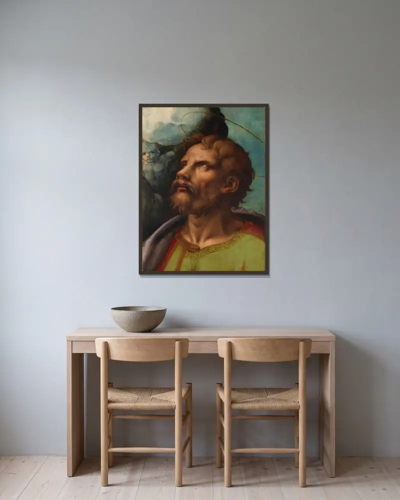 Ett helgonhuvud av Giulio Romano inramad på en vägg