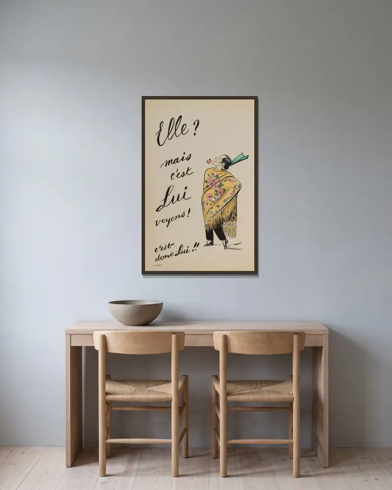 Elle av Georges Goursat (Sem) inramad på en vägg