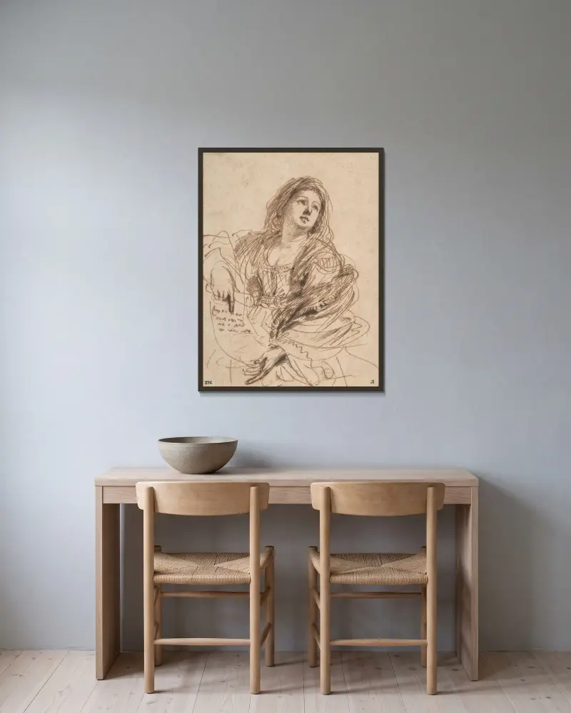 En sibylla med skriftrulle (studie för den kimmerska sibyllan) av Guercino inramad på en vägg