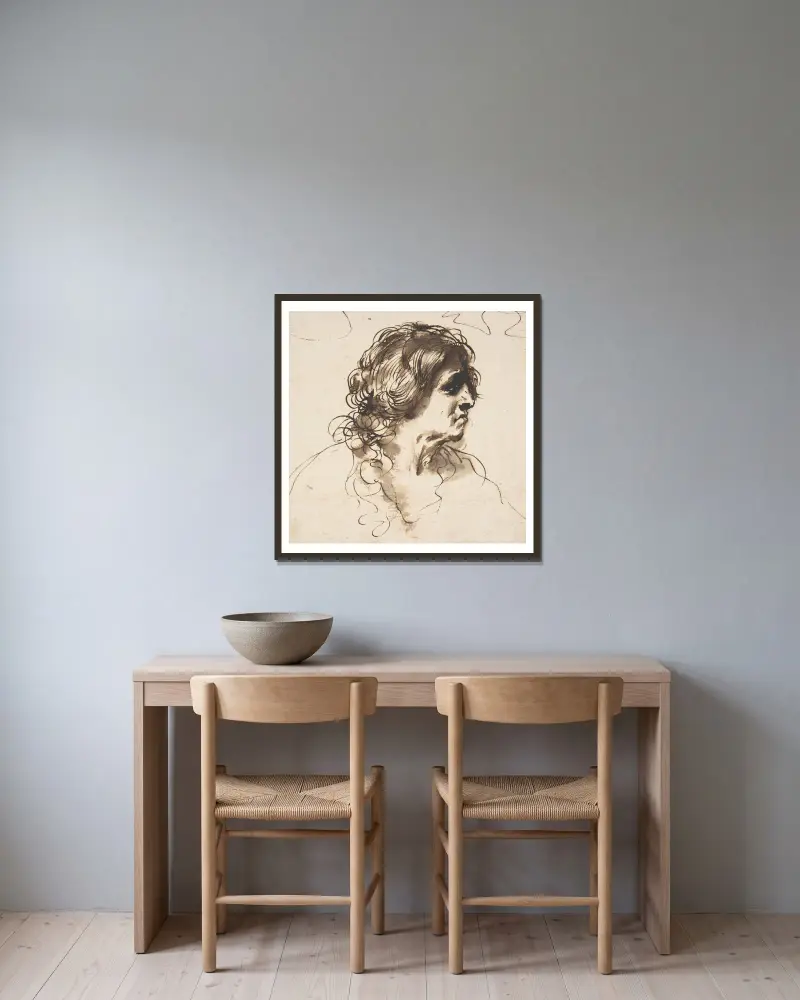 Bust of a Man Facing Right av Guercino inramad på en vägg