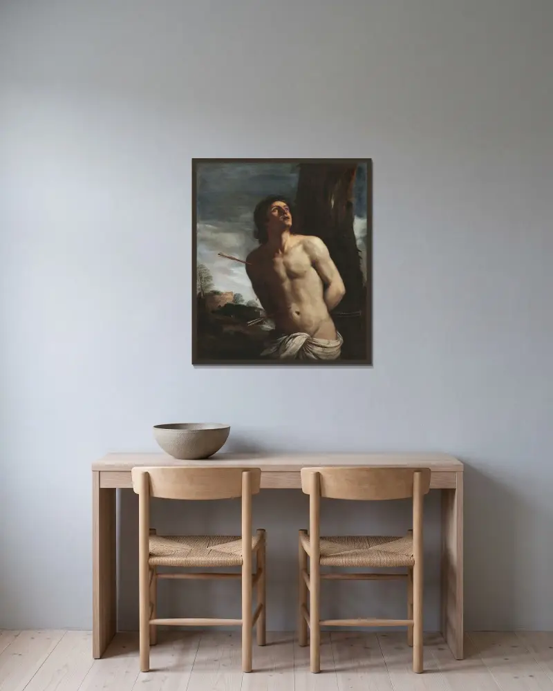 Sankt Sebastian av Guercino inramad på en vägg