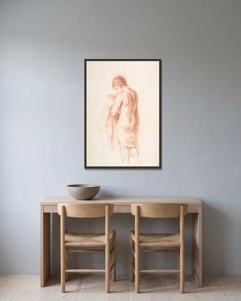 Stående yngling sedd bakifrån med en skål av Guercino inramad på en vägg