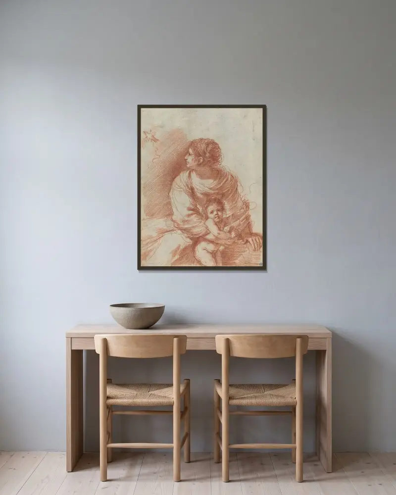 Madonnan och barnet med en undflugen steglits av Guercino inramad på en vägg