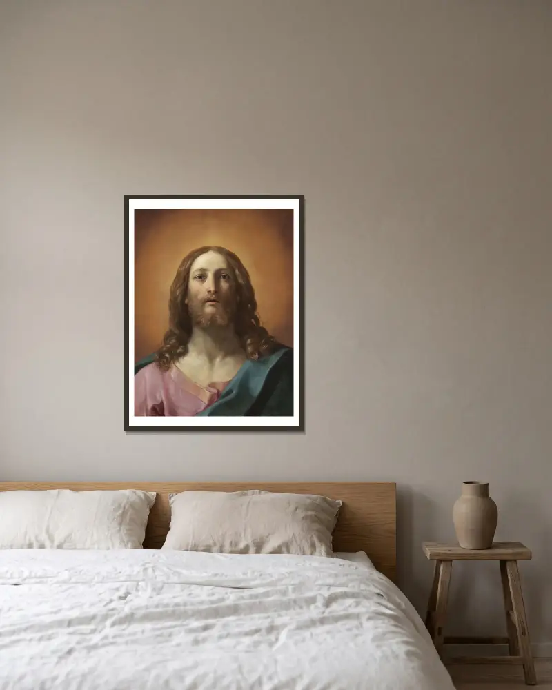 Byst av Kristus (Salvator Mundi) av Guido Reni inramad på en vägg