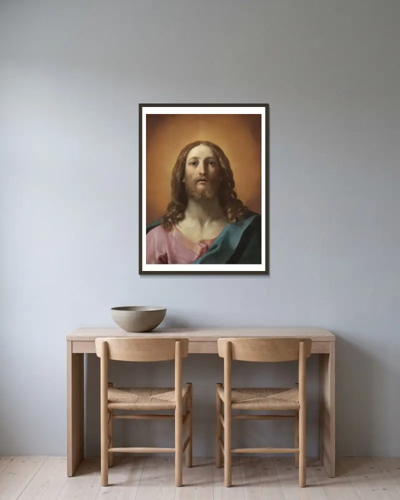 Byst av Kristus (Salvator Mundi) av Guido Reni inramad på en vägg