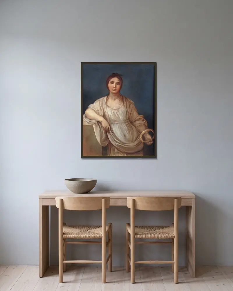 Porträtt av flicka med krona av Guido Reni inramad på en vägg