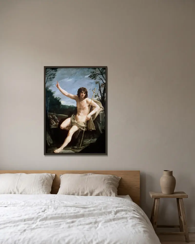 St John the Baptist in the Wilderness av Guido Reni inramad på en vägg