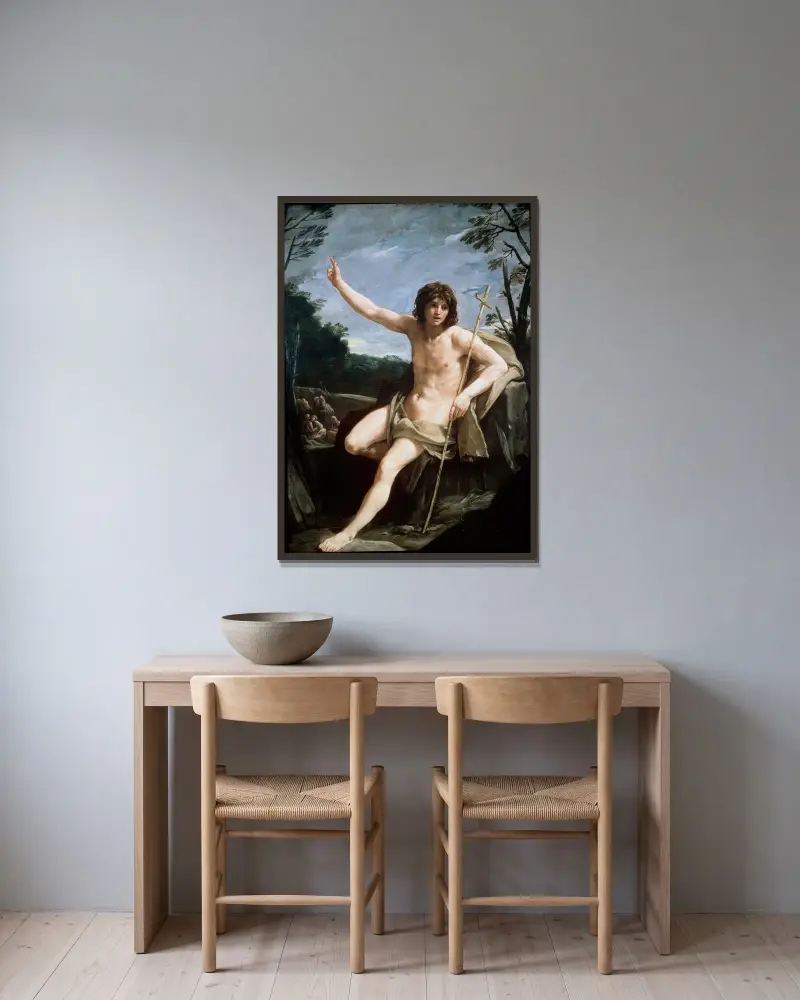 St John the Baptist in the Wilderness av Guido Reni inramad på en vägg