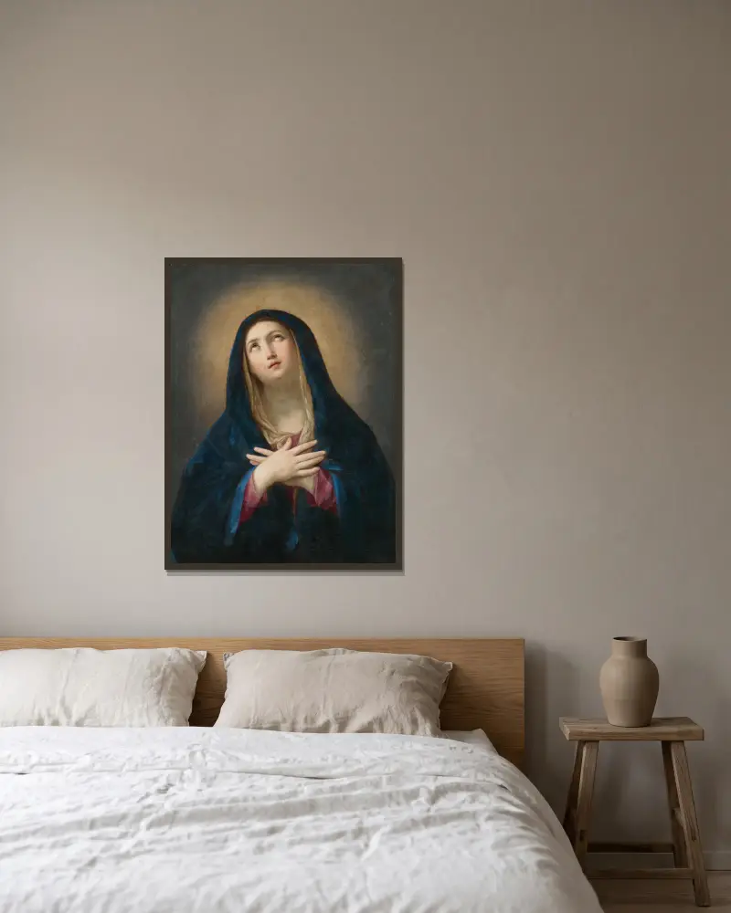 The Madonna in prayer av Guido Reni inramad på en vägg