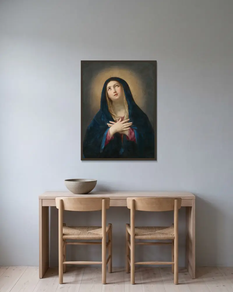The Madonna in prayer av Guido Reni inramad på en vägg
