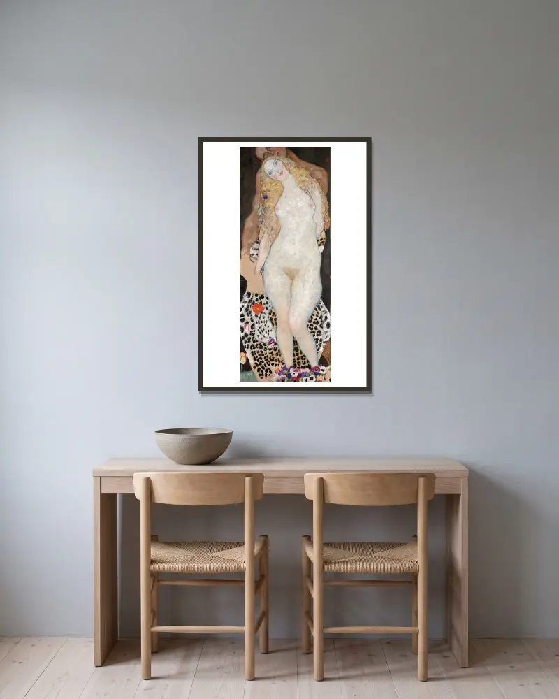 Adam und Eva von Gustav Klimt gerahmt an einer Wand